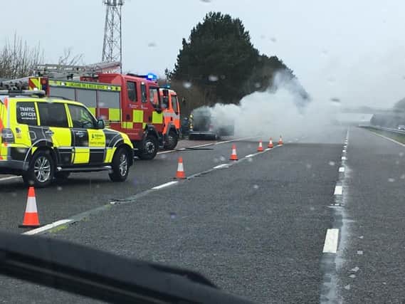 Firefighters tackling the blaze on the M55