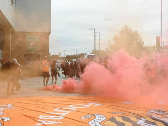 The previous flag was damaged by a flare during a fans' protest in 2017