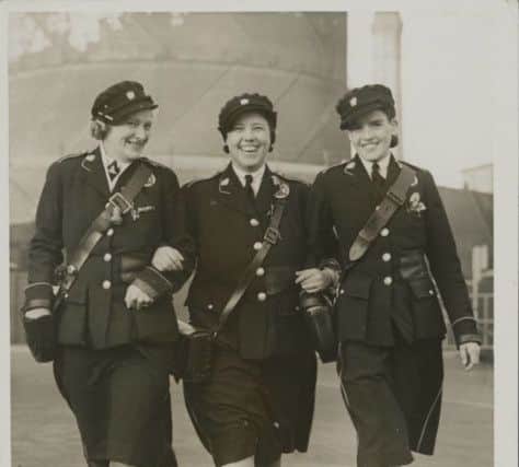 The Blackpool conductorettes issued with their new uniforms. Here is a trio of 'platform ' girls in their new attire, Blackpool. (Photo by Hulton Archive/Getty Images)