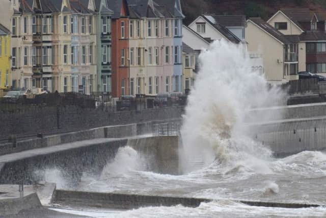 A spell of strong winds has hit the North West and weather warnings has been put in place.