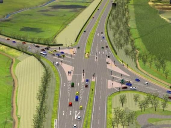 An artists impression of the proposed Poulton junction of the new A585 bypass  with a roundabout now replaced by traffic lights