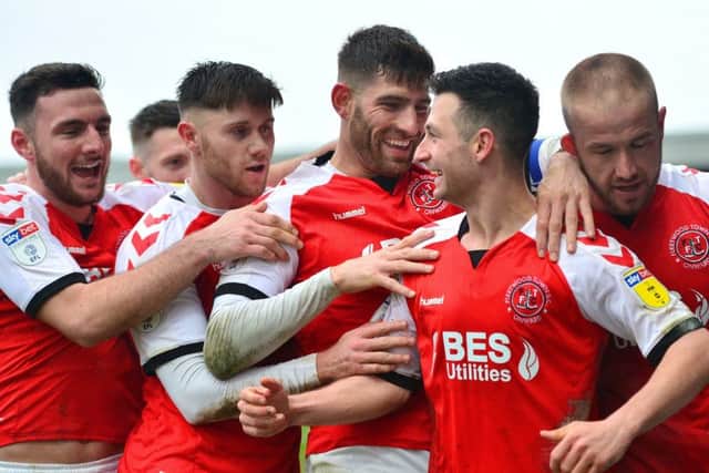 Jason Holt celebrates openign the scoring against Plymouth