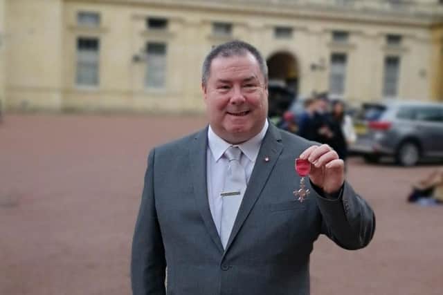 Jon with his MBE
