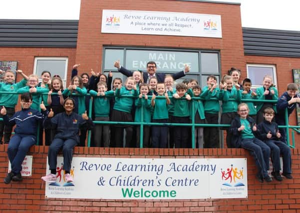 Children celebrate at Revoe Learning Academy