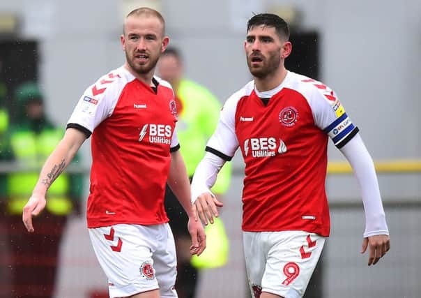 Fleetwood Town's Paddy Madden and team-mate Ched Evans
