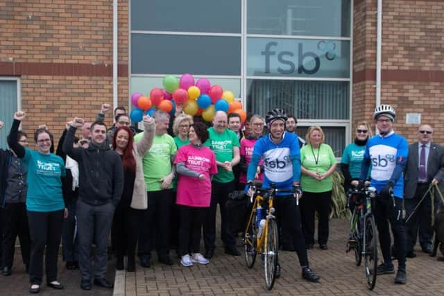 Blackpool staff and members form the Federation of Small Businesses give a resort send off to Ian ODonnell, front left, and fellow member Peter Davys who is joining Ian on the first leg of the charity bike ride in aid of the Rainbow Trust