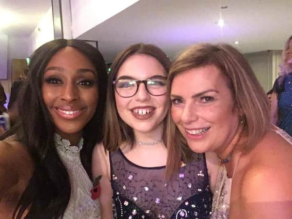 Ruth Murrell, pictured at the Pride of Britain award with daughter Emily and singer Alexandra Bruke, was injured during the Ariana Grande concert