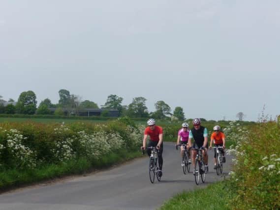 Cyclists near the Roseacre Wood fracking site