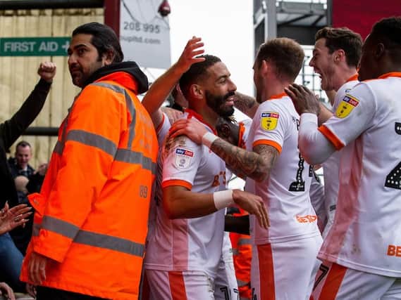 Blackpool's players celebrate with the jubilant fans