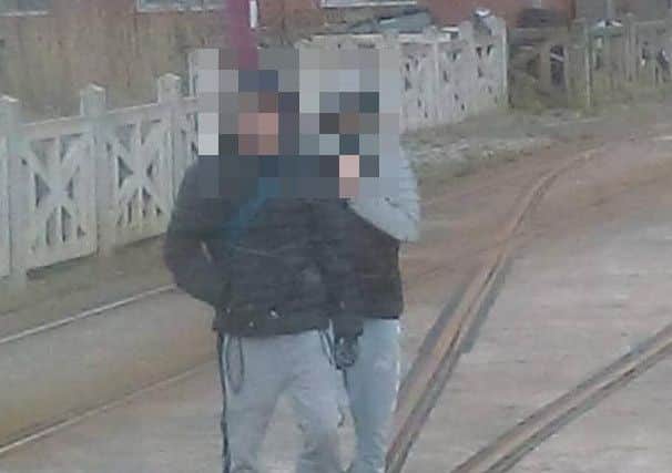 Youths were pictured on the tram tracks on Saturday
