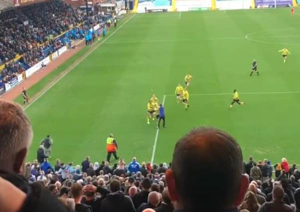 Two players ran on the pitch after AFC Fylde's last gasp winner yesterday (Picture: Match Days/YouTube)