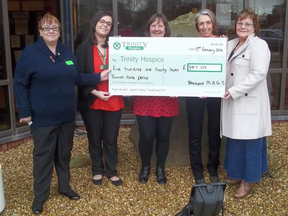 Members of Blackpool RMA Ladies presenting a cheque to Brian House Children's Hospice. (s)