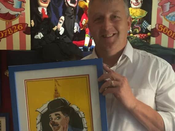 Nigel Male with a picture of his idol, former Blackpool Tower Circus clown Charlie Cairoli
