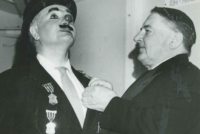 Charlie Cairoli (left) outside Blackpool Tower Circus