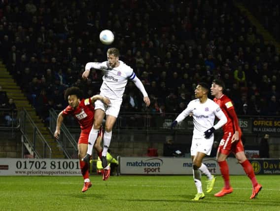 Neill Byrne climbs highest for Fylde at Leyton Orient Picture: STEVE MCLELLAN