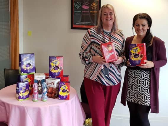 Carmel Roberts and Sarah Edgar, from The Calico Groups HR team, with the Easter egg collection