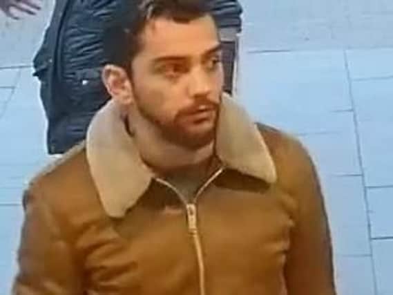 Police want to speak to this man in connection with a suspected fraud at Booths supermarket in Carnforth