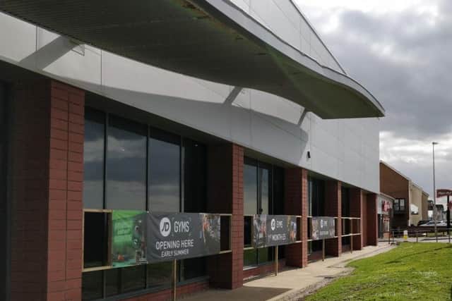 Signs advertising the gym have gone up outside the former ice rink