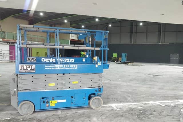 The building's interior remains relatively bare, ahead of the gym's planned opening in the summer