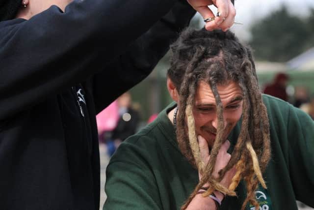 Barber Simon Reeves getting rid of of Blackpool Zoo worker Dom Ricchuiti on Saturday afternoon