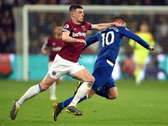 Declan Rice has played down rumours linking him with a move to Manchester United or Manchester City in the summer transfer window and the 20-year-old England international insists he is happy at West Ham.