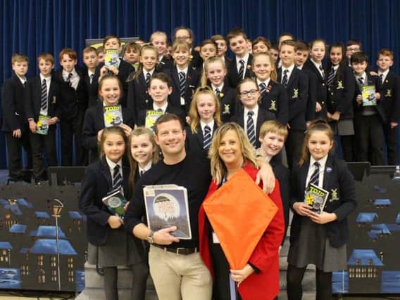 Dermot O'Leary meets pupils from Kirkham Grammar School.