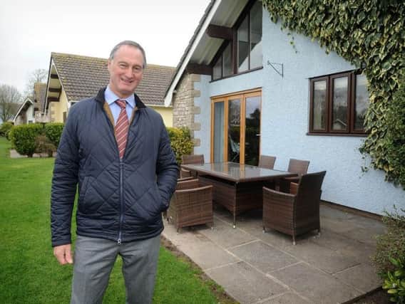 Paul Harrison pictured near the original cottages built at Ribby Hall Village in 1995. The holiday centre is celebrating its 25th anniversary.