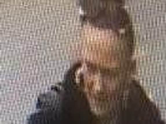 Police want to speak to this woman in connection with a theft of a purse on Highfield Road, Blackpool at 12.40pm on April 1.