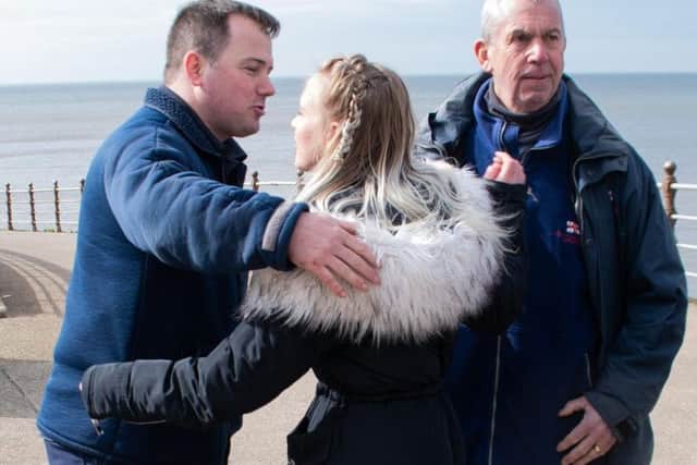 Shelby Burns thanks Nathan Lee from the RNLI for saving her life
