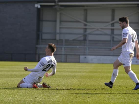 Nick Haughton celebrates his goal against Eastleigh Picture: STEVE MCLELLAN