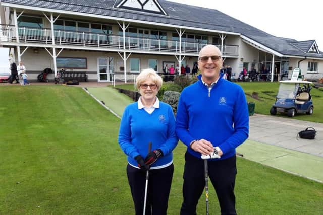 Incoming Knott End Golf Club captains Elaine Blackburn and Steve Maughan