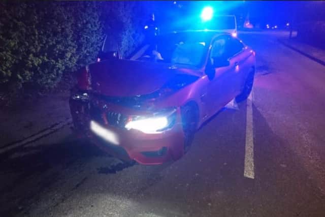 The red BMW crashed on Moss Side Lane. Credit: Lancs Road Police