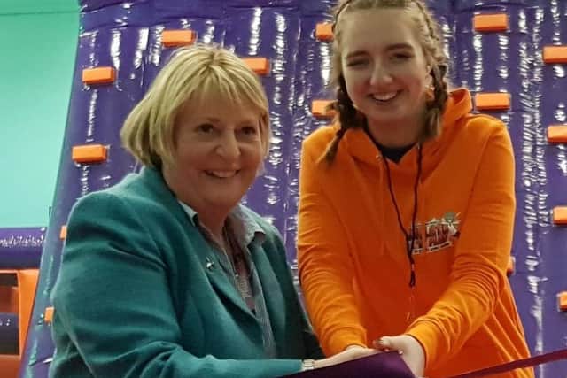 Aspire Academy head teacher, Lisa Shuttleworth-Brown and Natalie Taylor, Head Girl cut the ribbon to open Inflate and Play Blackpool