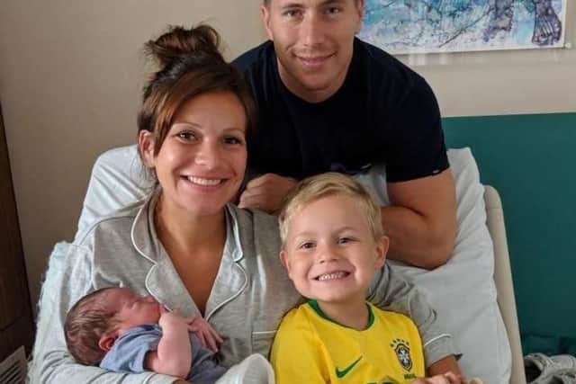 Maria Webster, with Luke Melville, her son George, and little Leo Melville, who was born weighing 9lb 7oz
