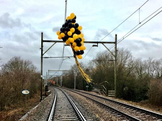 Helium balloons on the rail network