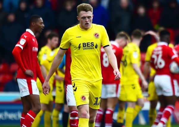 Fleetwood Town's Harry Souttar walks off after being shown a red card at Barnsley