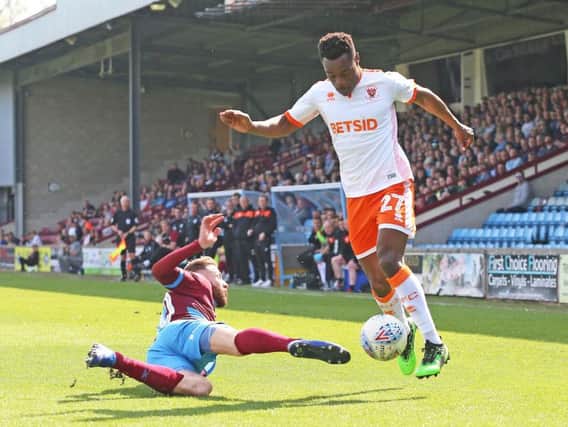 Marc Bola in action at Glanford Park
