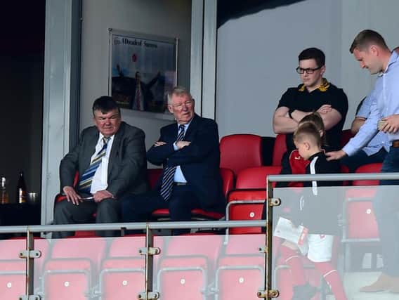 Sir Alex Ferguson watches on at Highbury