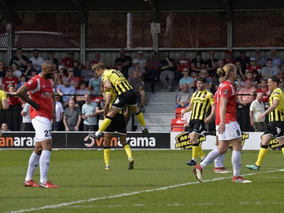 Fylde celebrate Alex Reid's winning goal Picture: STEVE McLELLAN