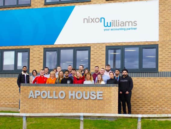 The Nixon Williams team outside their new offices in Blackpool