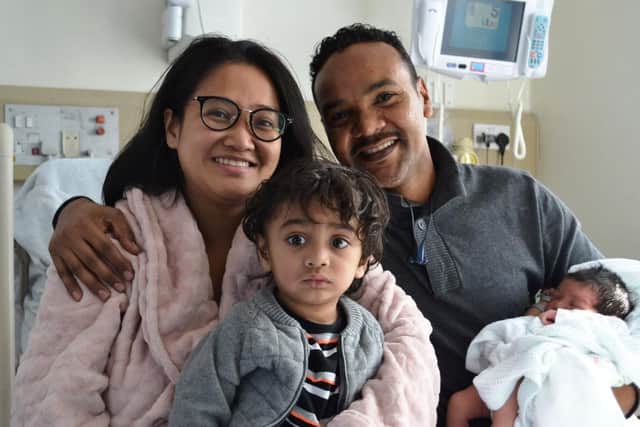 The Ibrahims with their newborn, who arrived in a hurry in Blackpool Vic's car park