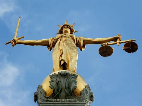 'Despicable human being' who bit off part of ex-girlfriend's ear jailed