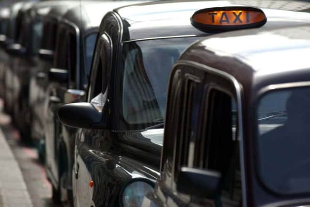 Black cabs queuing for business in Blackpool