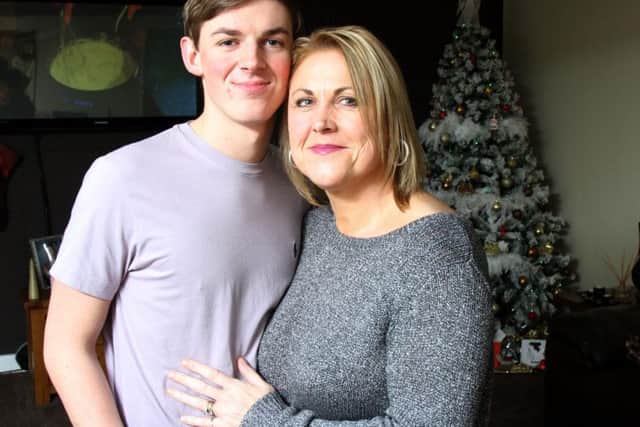 James with mum Maria in 2014