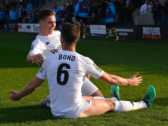 Andy Bond and Nick Haughton celebrate the second goal