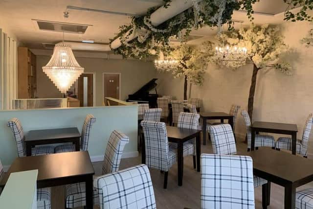 Trees and chandeliers make the new tea room feel up market