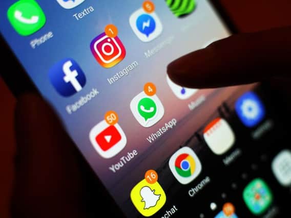 Nearly half of UK teenagers believe that using social media makes them feel less lonely, despite concerns from parents, new research shows.