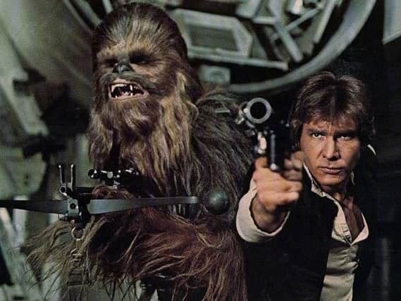 Peter Mayhew, Chewbacca, and Harrison Ford, Han Solo