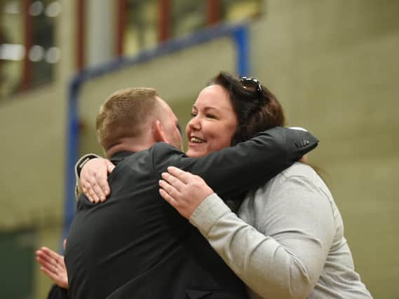 Gillian Campbell hugs Simon Blackburn as the result is announced
