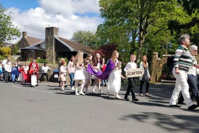 The Rose Queen procession marched through the Wyre village